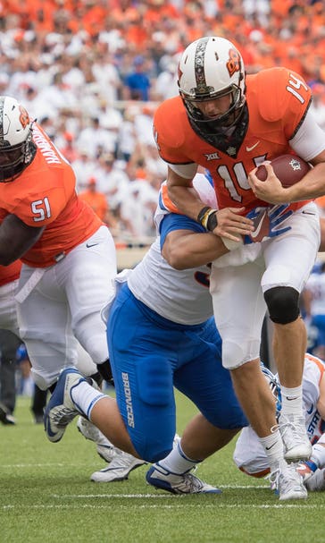 Cornelius leads No. 24 Oklahoma St. past No. 17 Boise St.